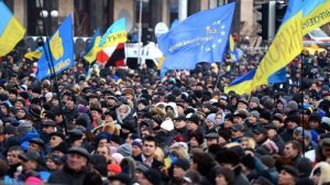 The protests in Kiev.  Note the blue and gold flag of Ukraine alongside the blue with gold stars of Europe.